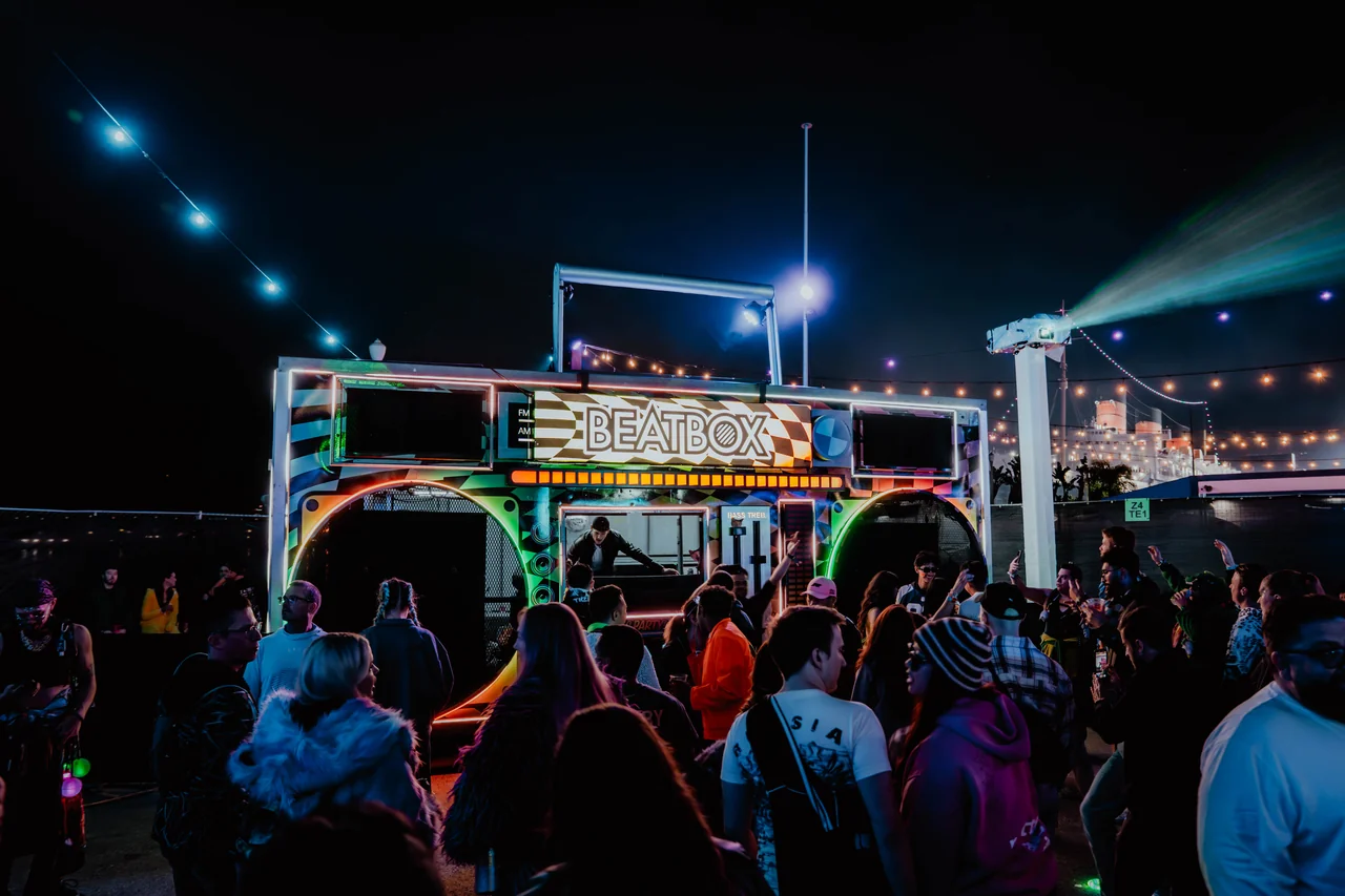 The crowd dancing in front of the illuminated BeatBox stage at Dreamstate 2025.